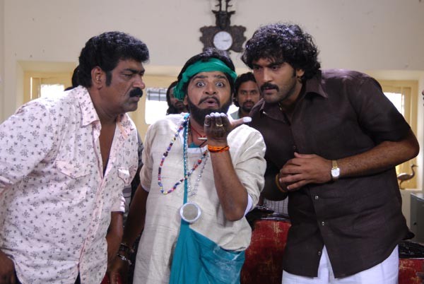 Kalavar King Movie Stills - 26 / 52 photos